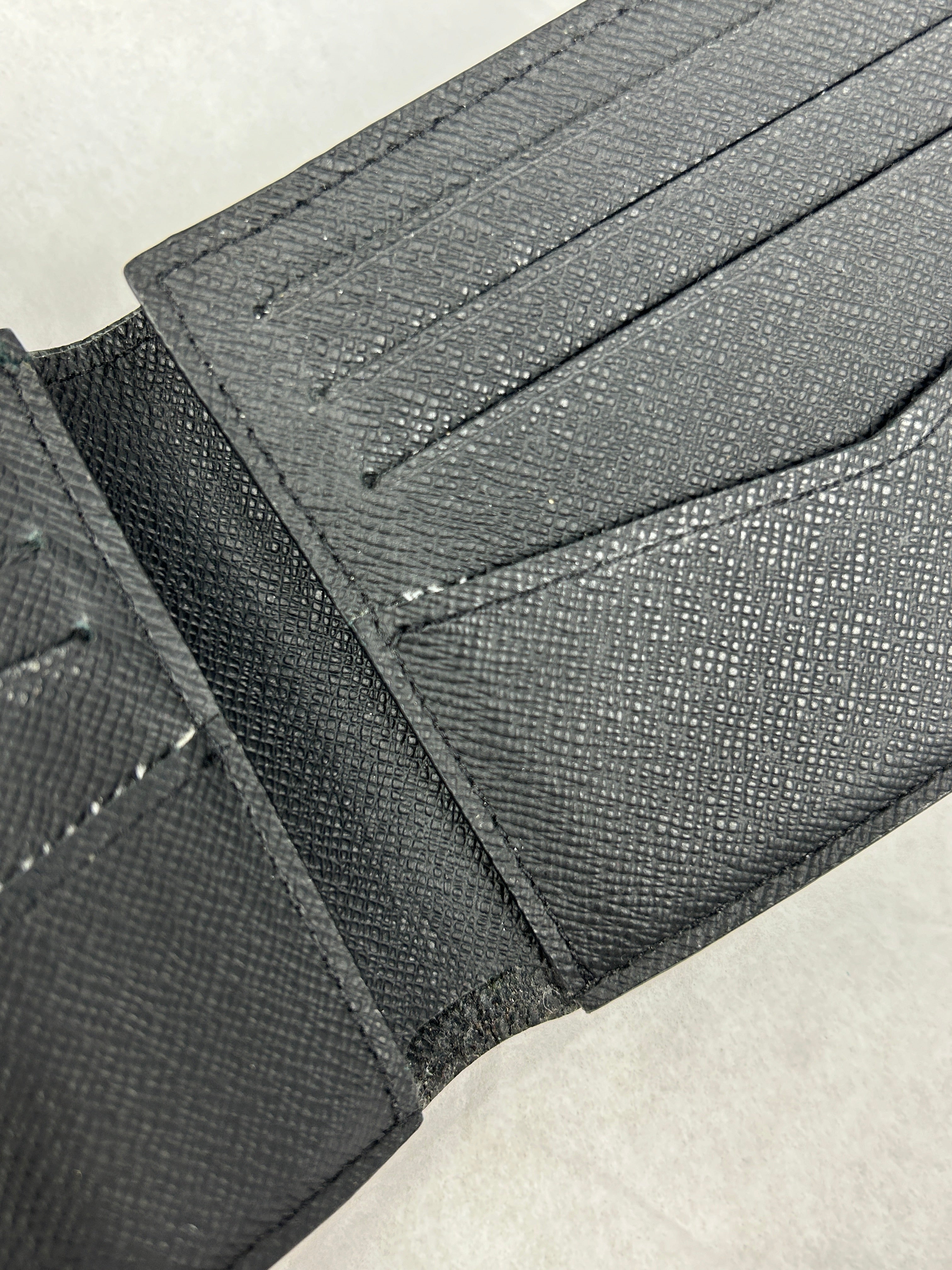 Monogram Coated Canvas Eclipse Bifold Wallet
