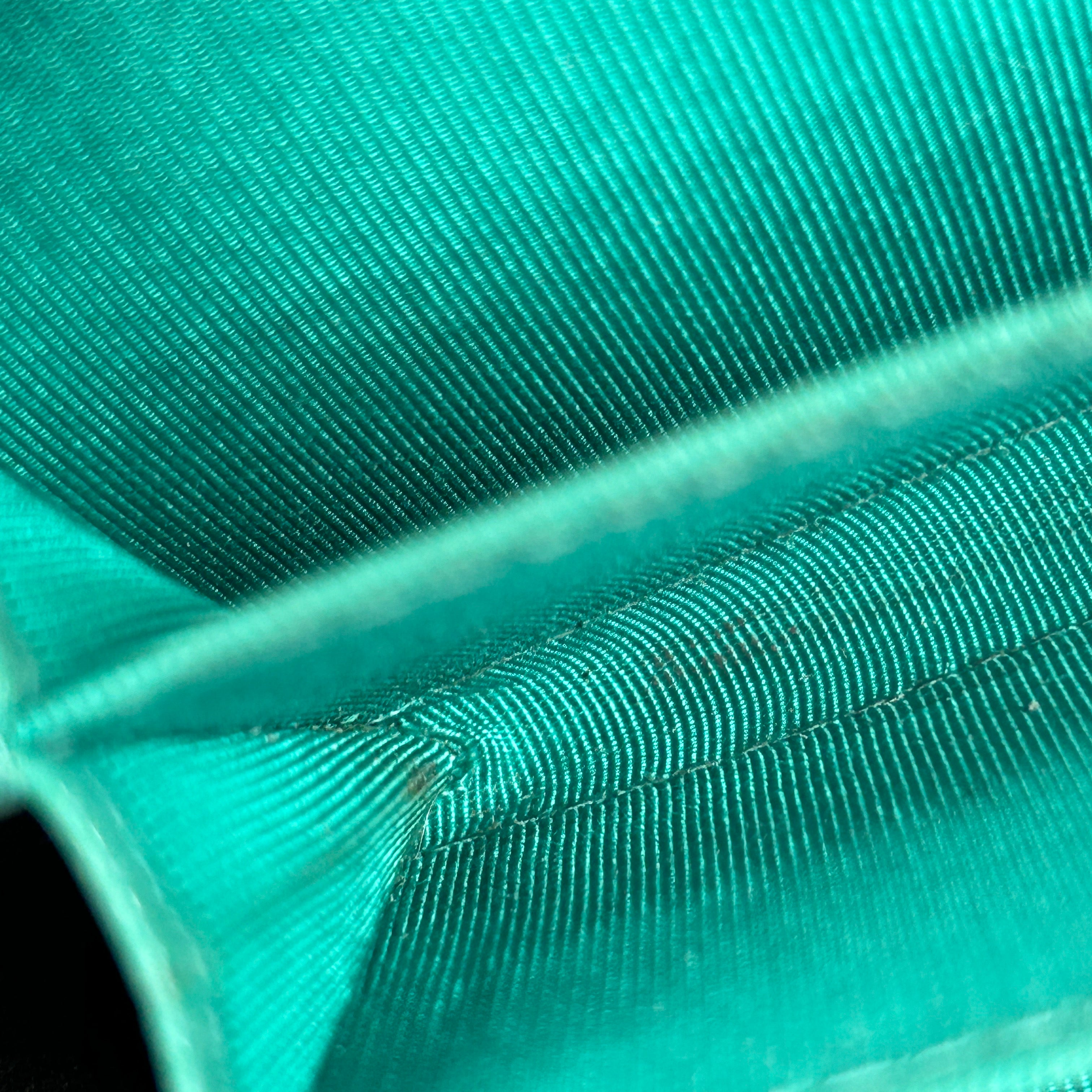 Caviar Quilted Turquoise Zippy Card Wallet