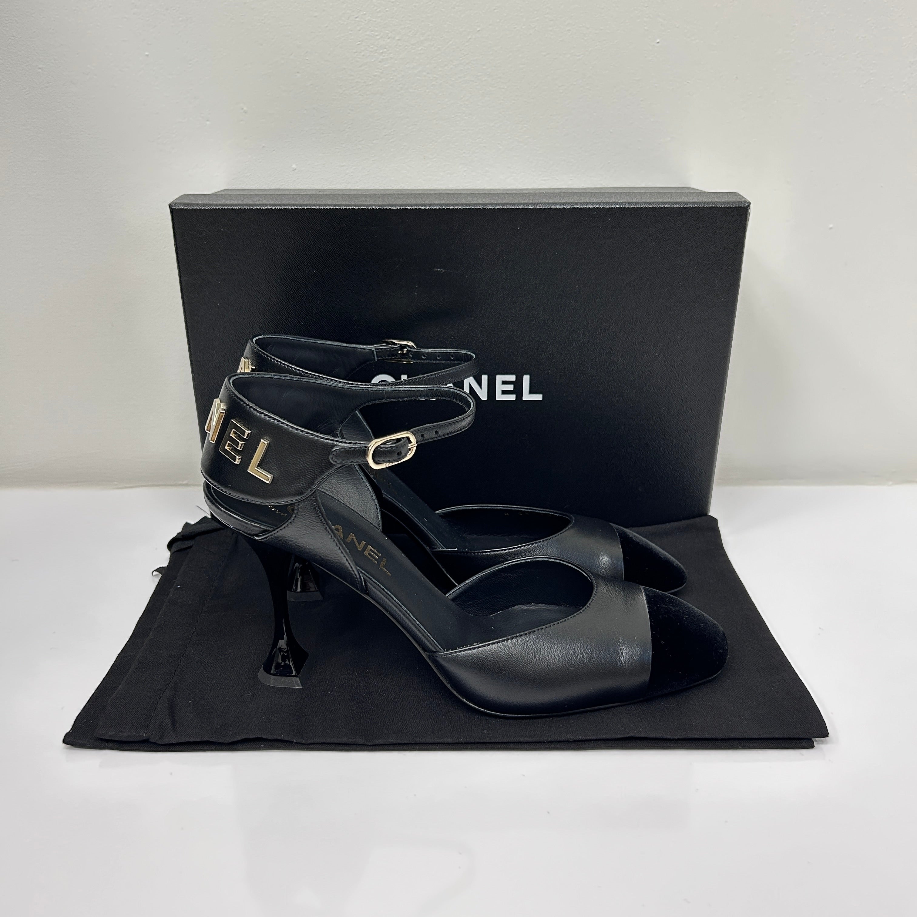 Black Lambskin Velvet Cap Toe Logo Strap Pumps