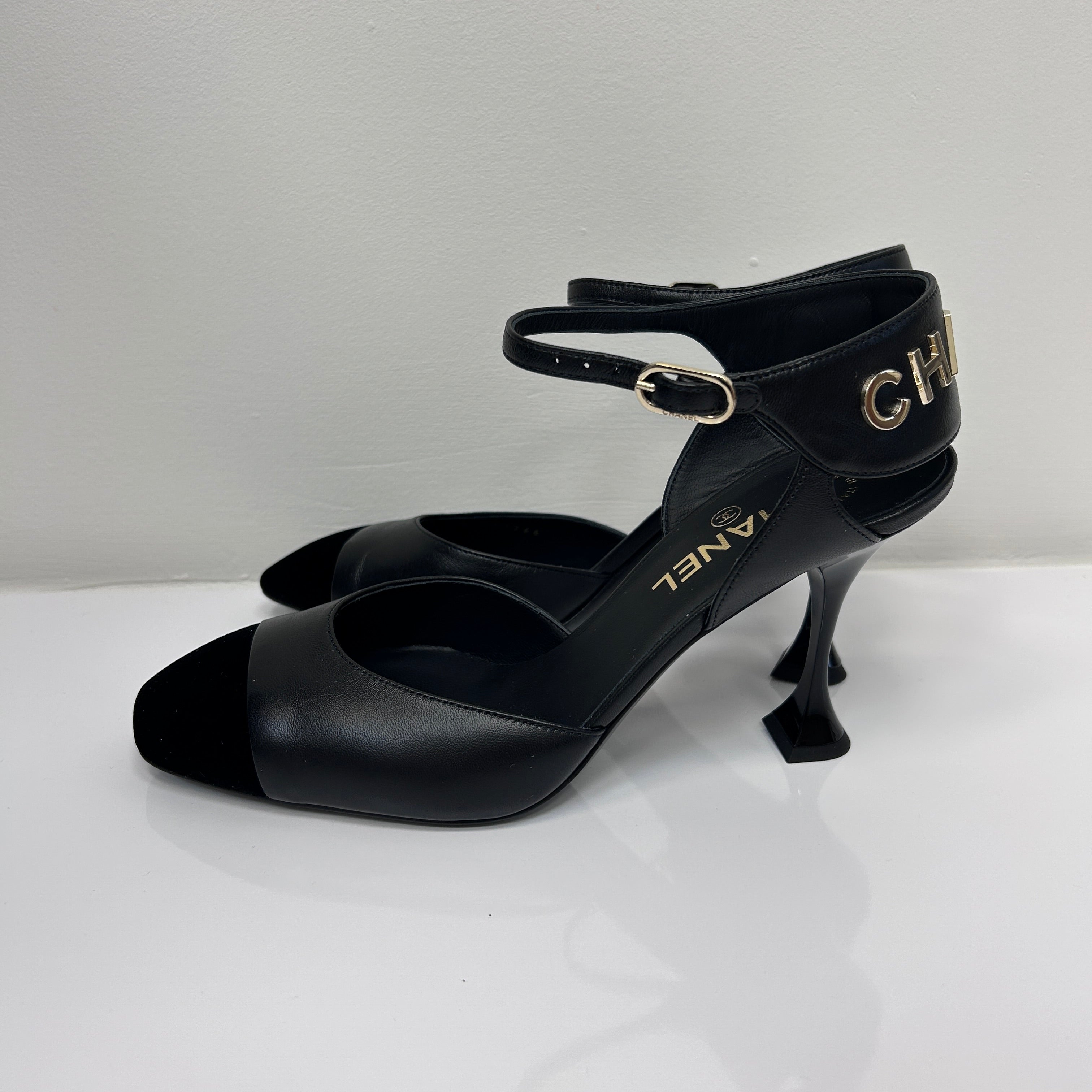 Black Lambskin Velvet Cap Toe Logo Strap Pumps