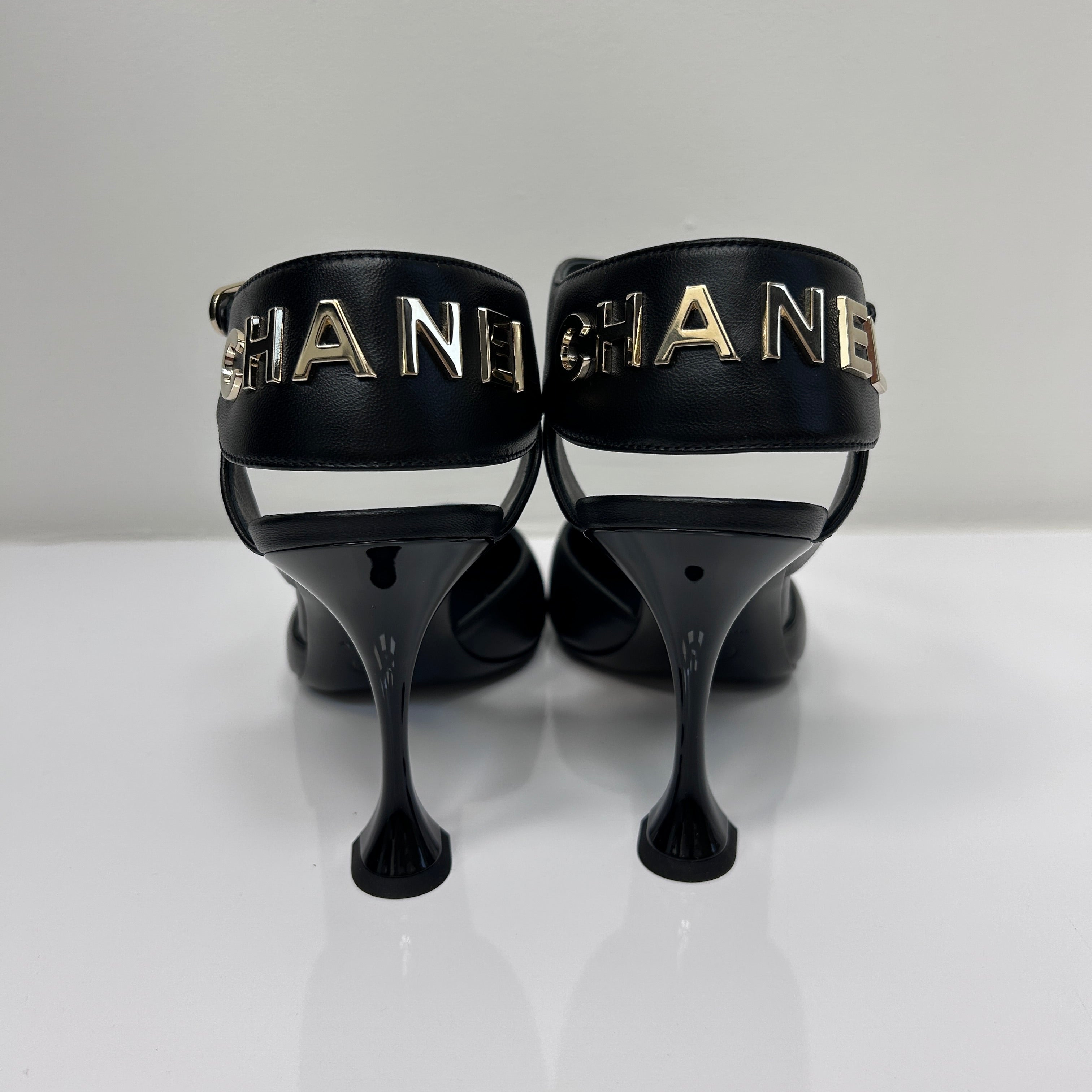 Black Lambskin Velvet Cap Toe Logo Strap Pumps